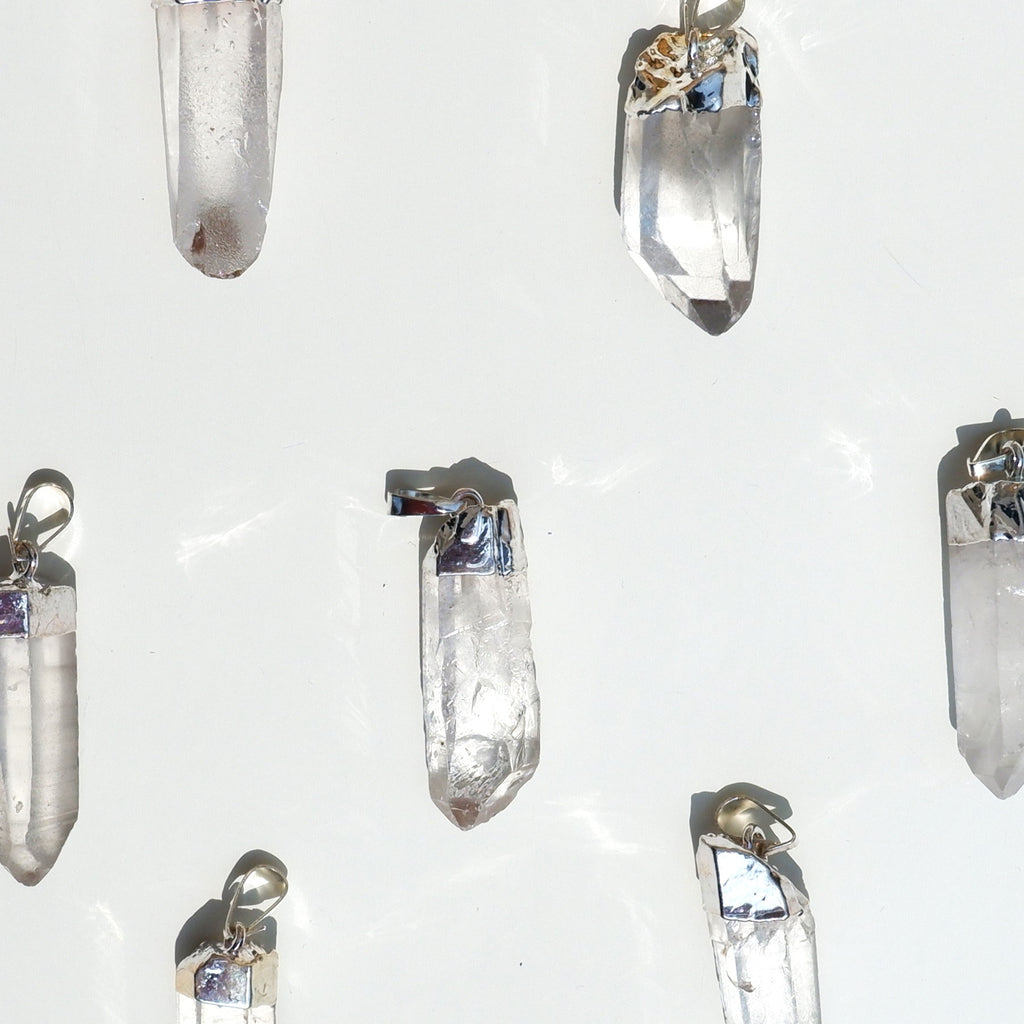 Pendentif Cristal de roche brut ❄️ Sixième sens, sérénité, et purification