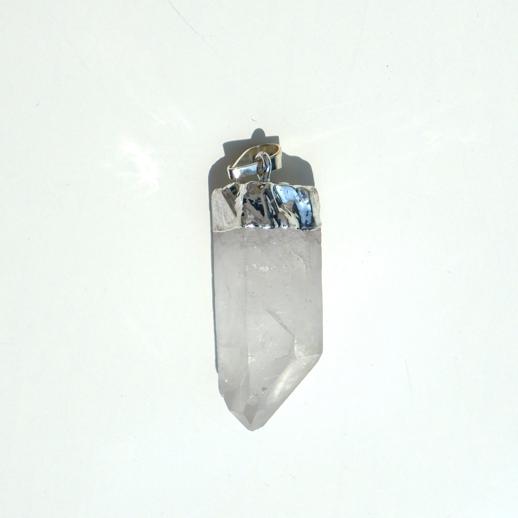 Pendentif Cristal de roche brut ❄️ Sixième sens, sérénité, et purification