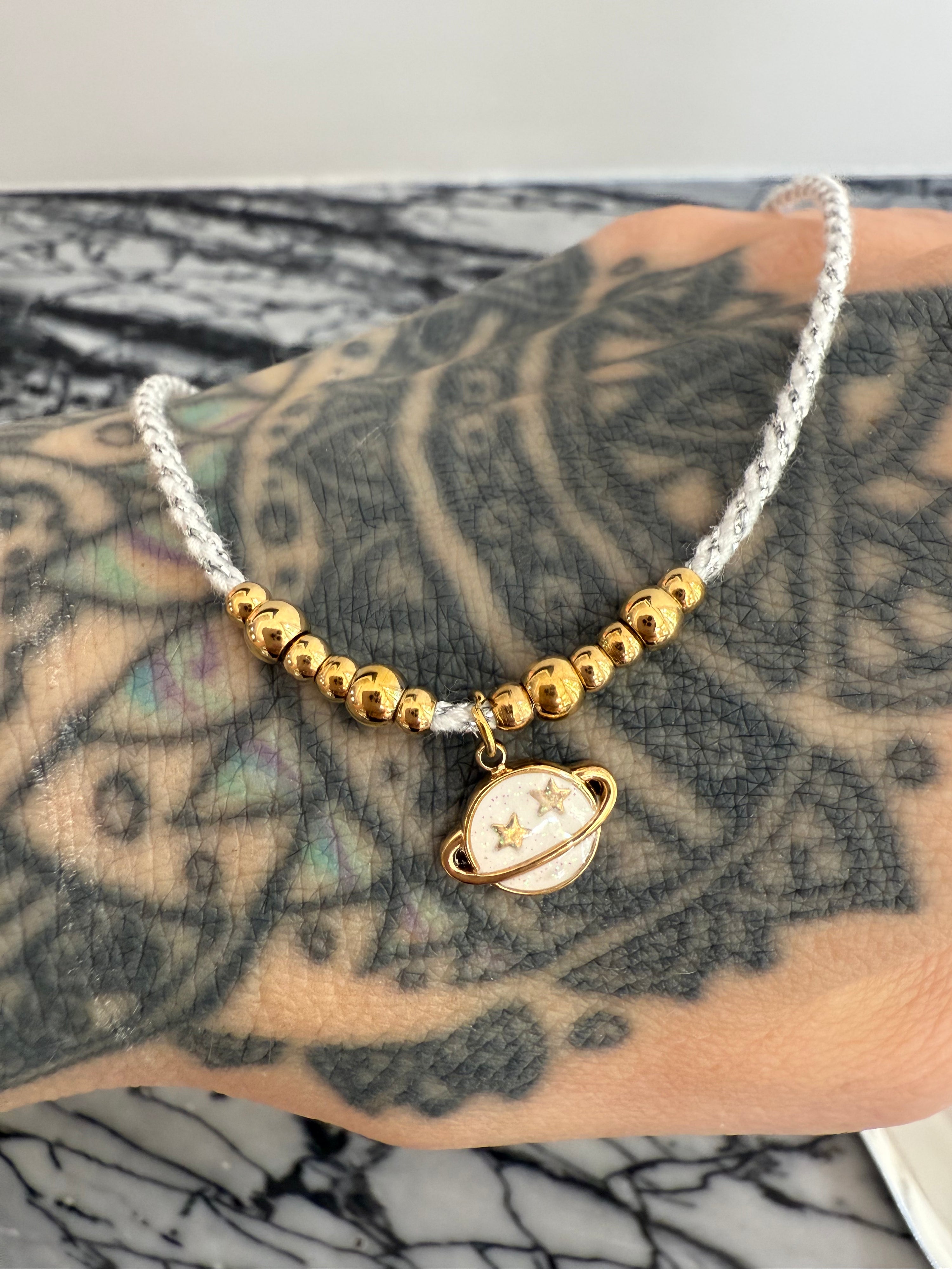Collier Saturne paillettes