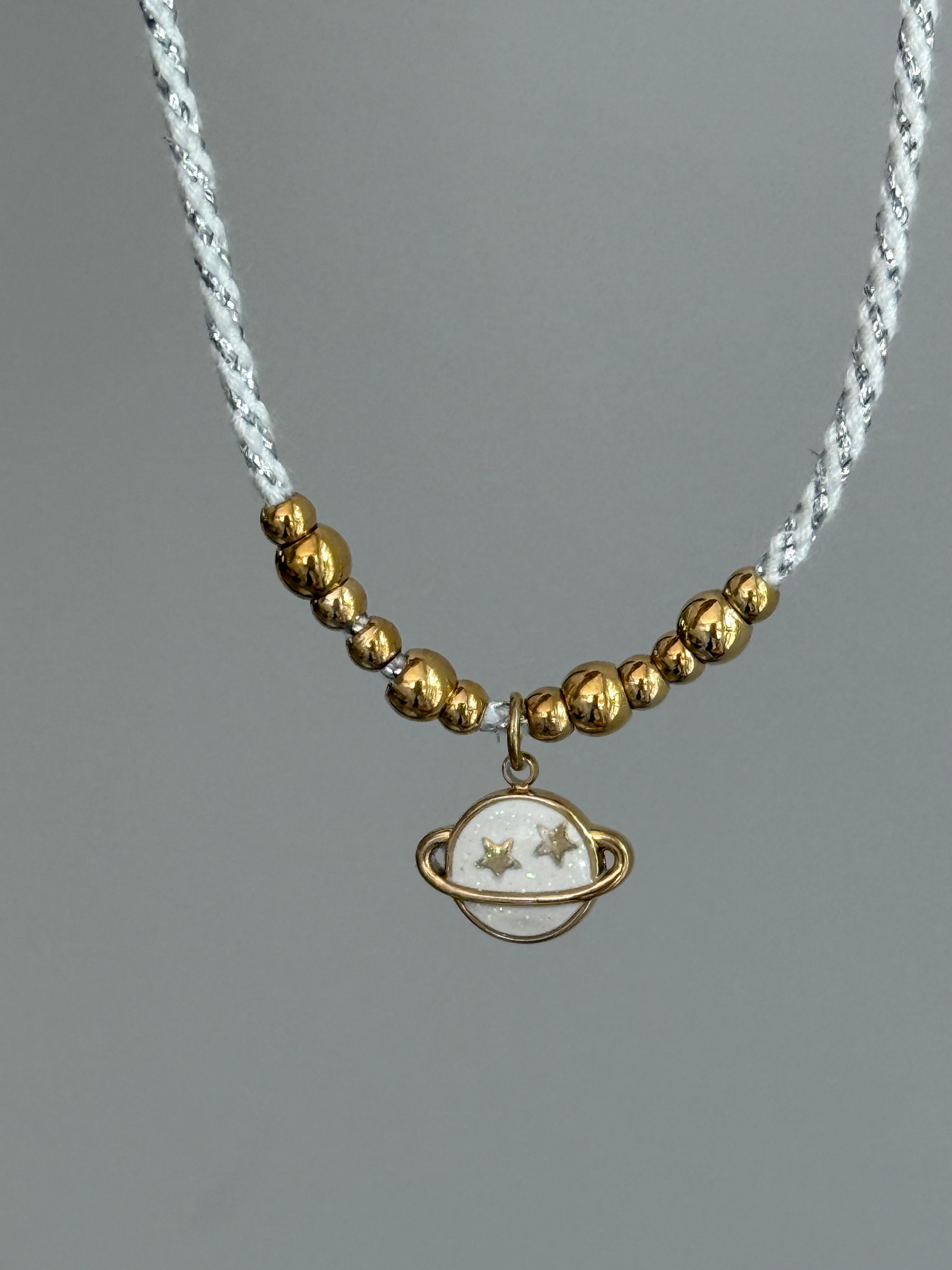 Collier Saturne paillettes